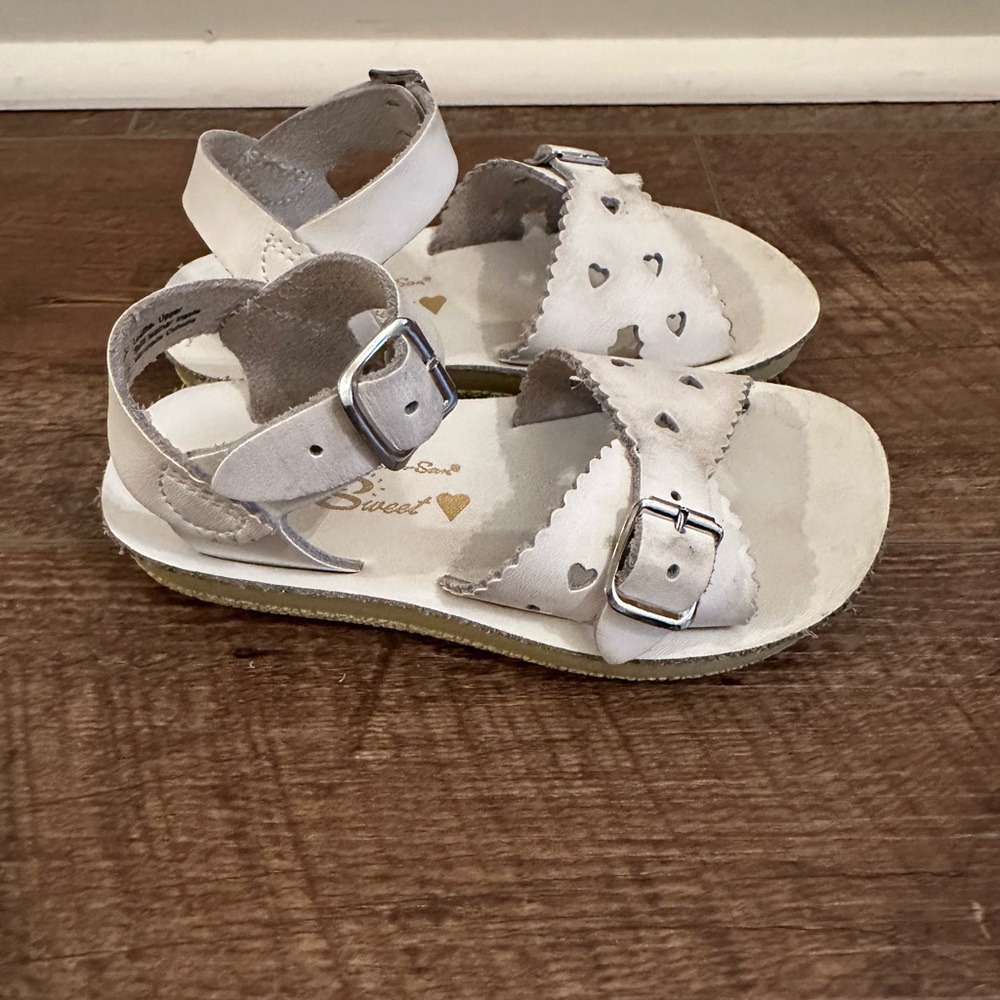 White Sandals with Adjustable Straps and Durable Soles
